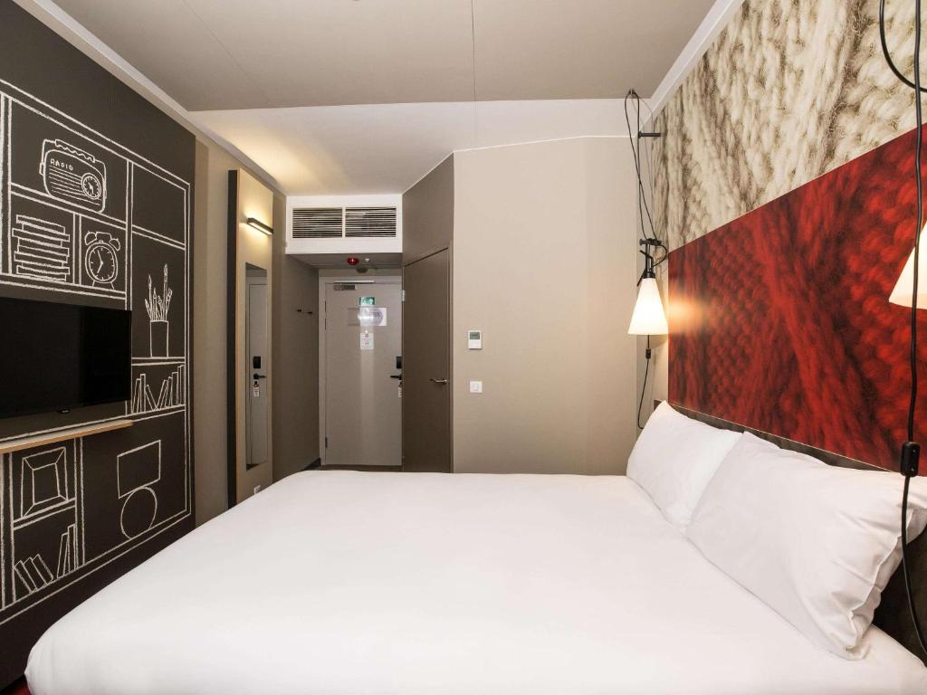 Postel nebo postele na pokoji v ubytování ibis Vilnius Centre