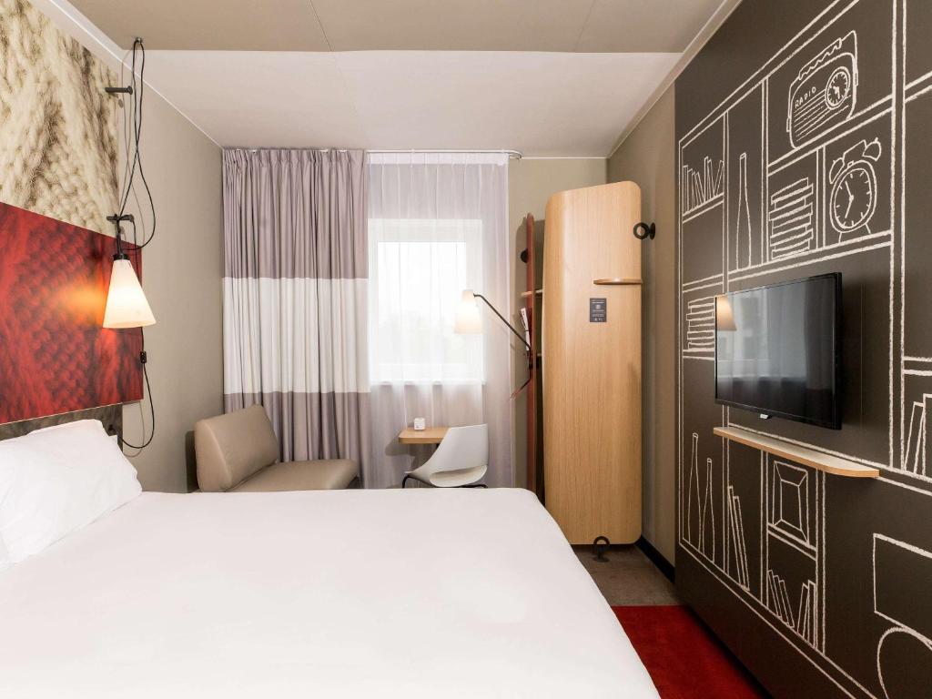 Postel nebo postele na pokoji v ubytování ibis Vilnius Centre