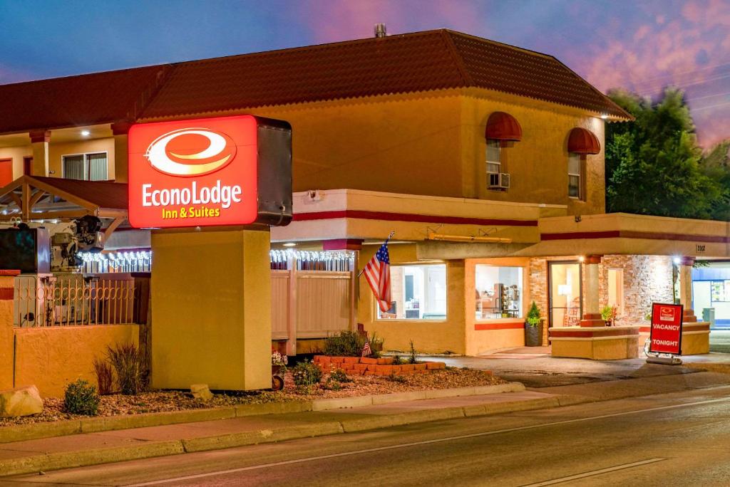 a fast food restaurant with a sign on the side of a building at Econo Lodge Inn & Suites Durango in Durango