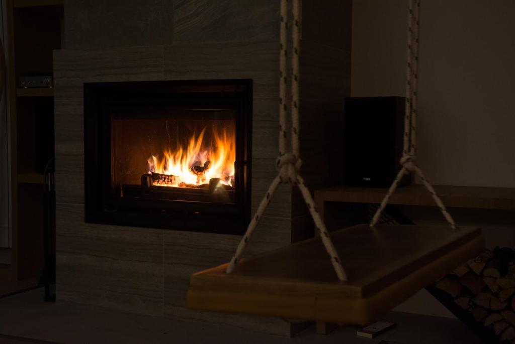 Fotografie z fotogalerie ubytování George Snow Apartments in New Gudauri - fireplace, 50m to Gondola lift v destinaci Gudauri