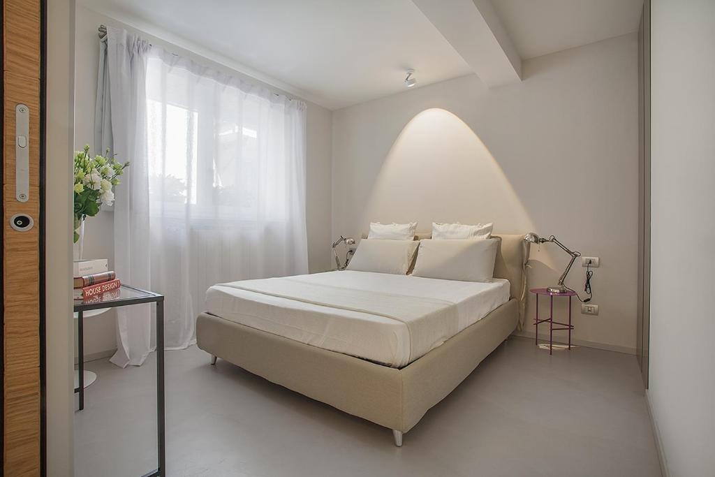 Postel nebo postele na pokoji v ubytování La Cortevecchia