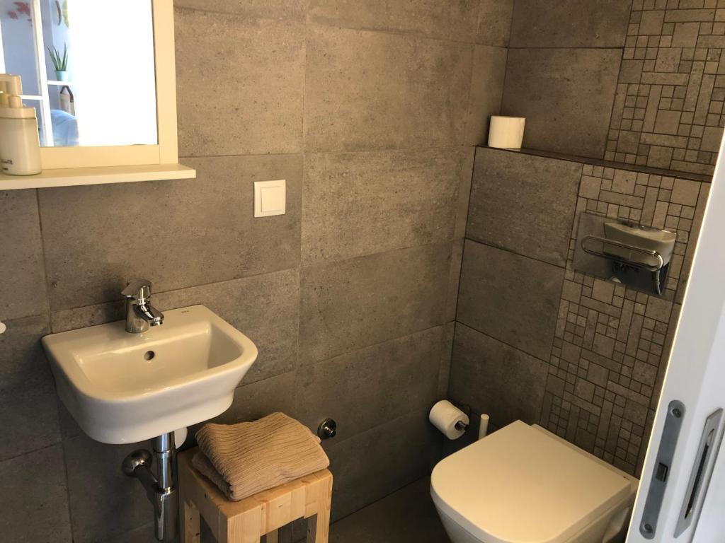 Koupelna v ubytování adubai Obidos