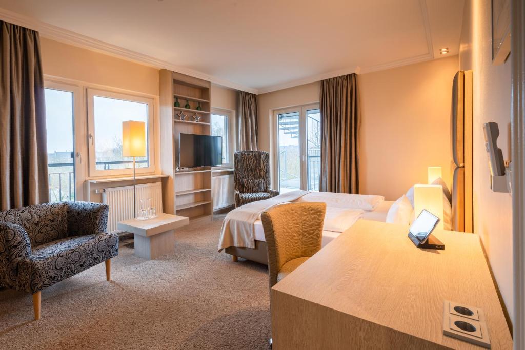 Postel nebo postele na pokoji v ubytování Thomas Hotel Spa & Lifestyle