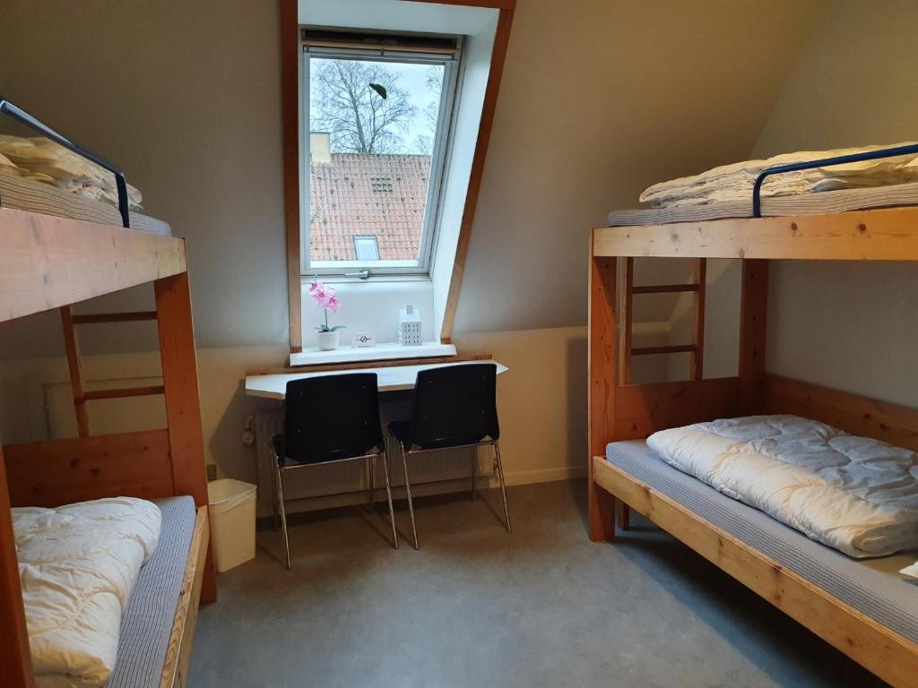 Postel nebo postele na pokoji v ubytování Danhostel Ringsted