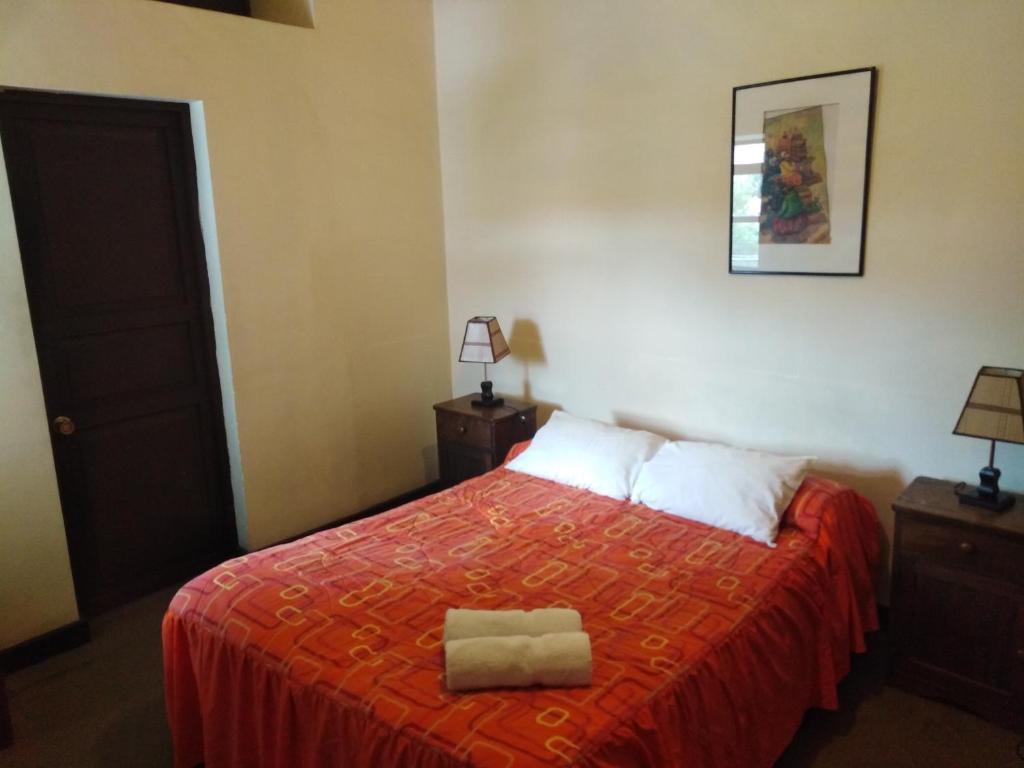 Postel nebo postele na pokoji v ubytování El Tuco Hotel