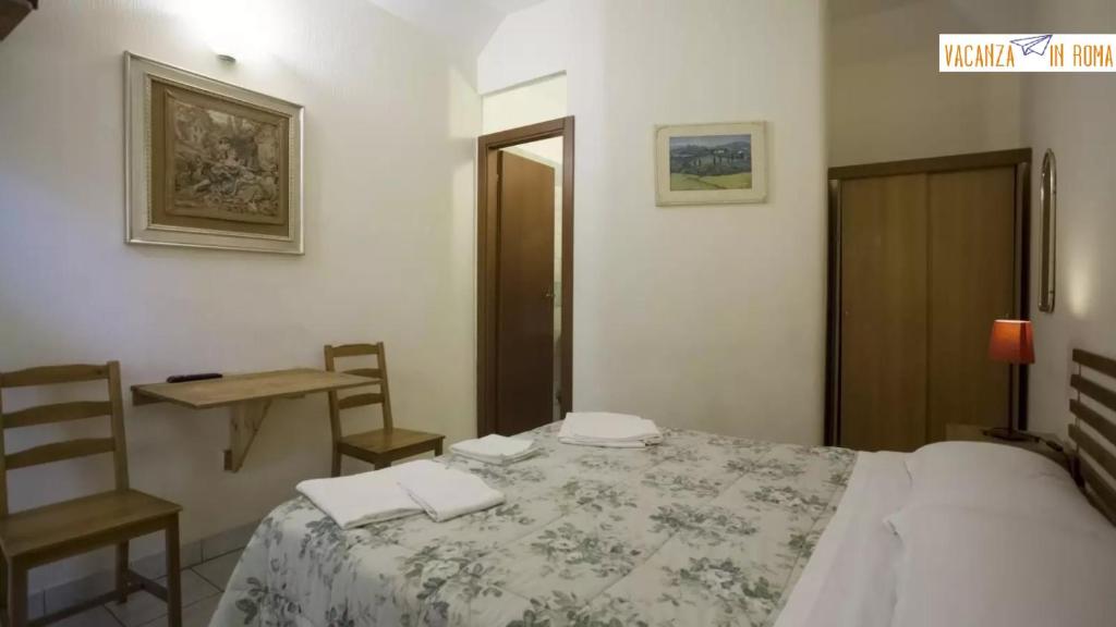 Postel nebo postele na pokoji v ubytování Al Pantheon Con Thomas Mann
