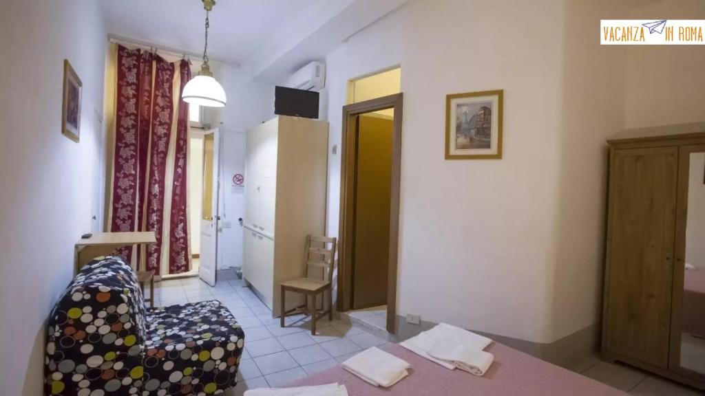 Postel nebo postele na pokoji v ubytování Al Pantheon Con Thomas Mann