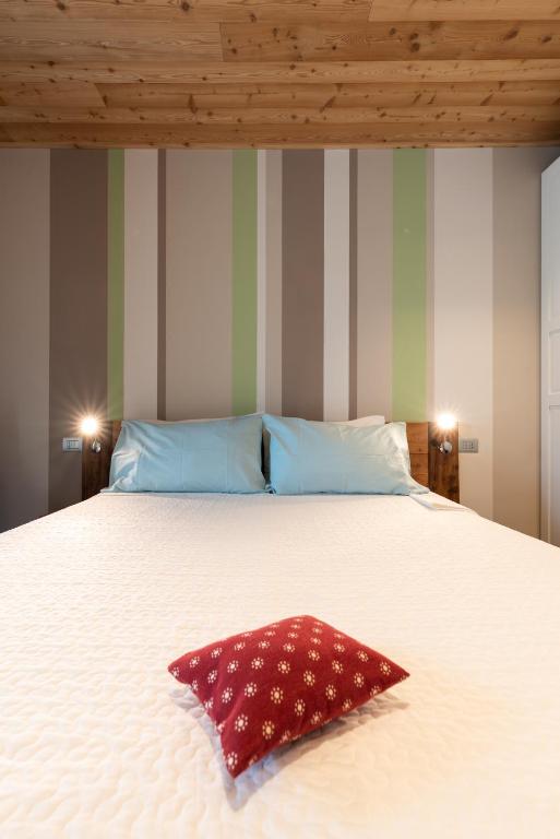 A bed or beds in a room at Casa Monet