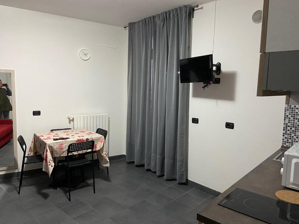 A television and/or entertainment centre at BICOCCA APPARTAMENTI