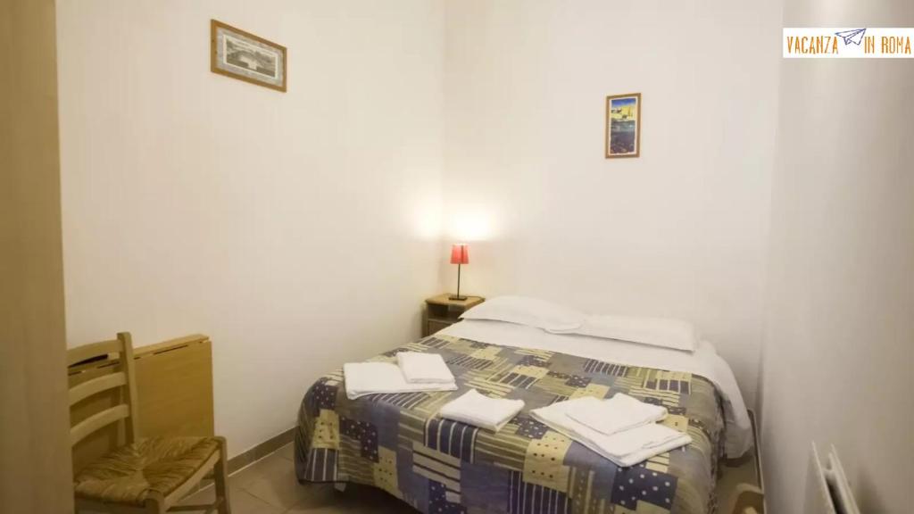 Postel nebo postele na pokoji v ubytování Al Pantheon Con Thomas Mann