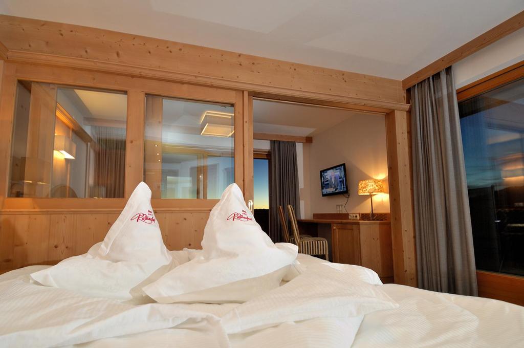 Posteľ alebo postele v izbe v ubytovaní Hotel Rosslaufhof