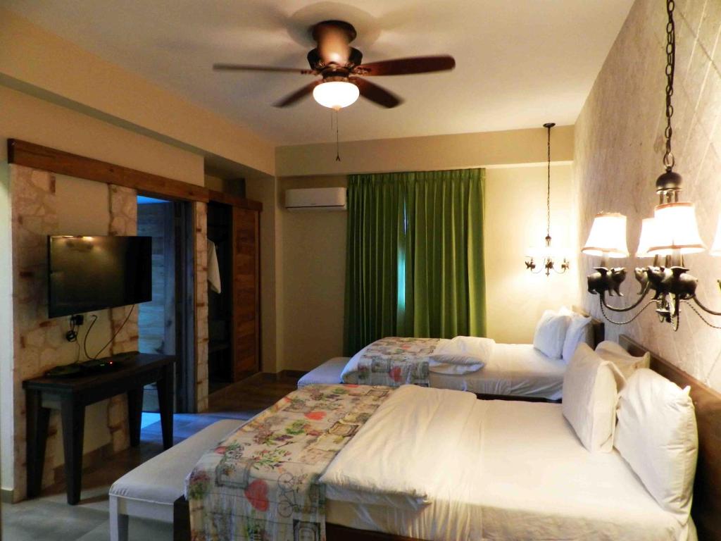 Postel nebo postele na pokoji v ubytování MON Hotel Boutique