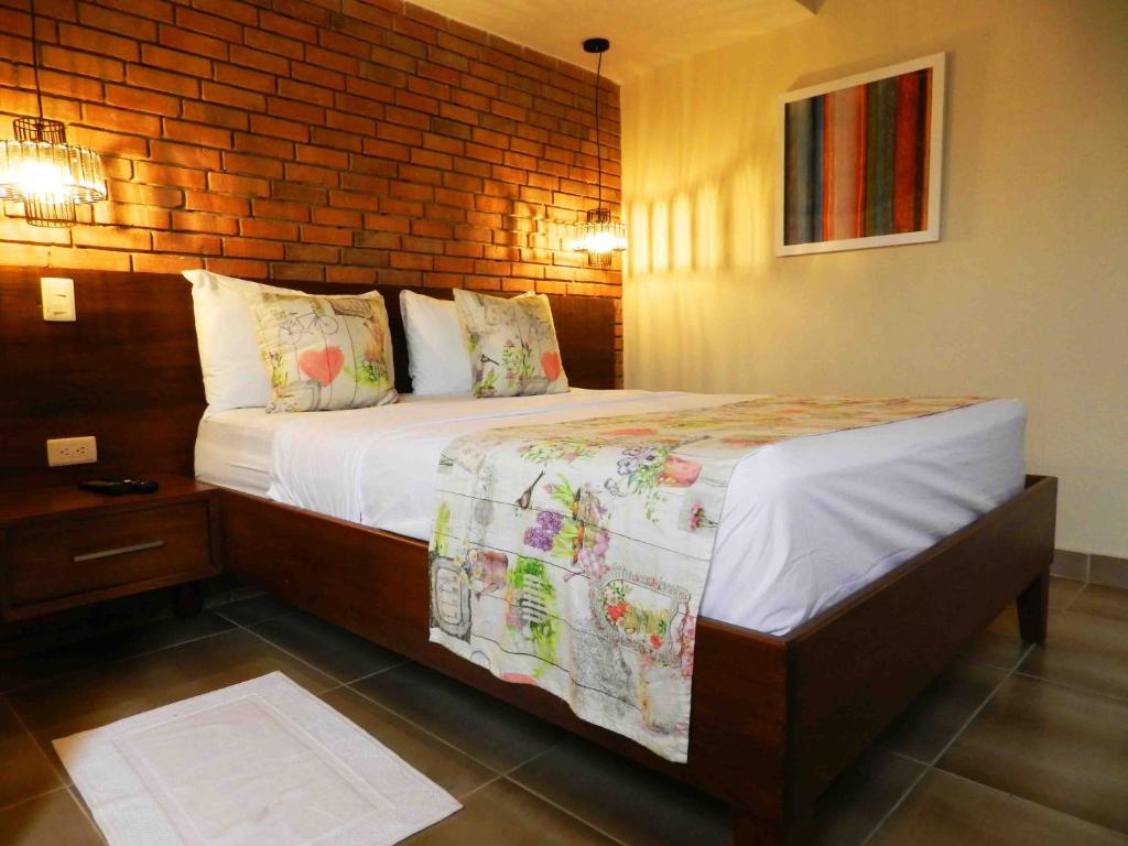 Postel nebo postele na pokoji v ubytování MON Hotel Boutique