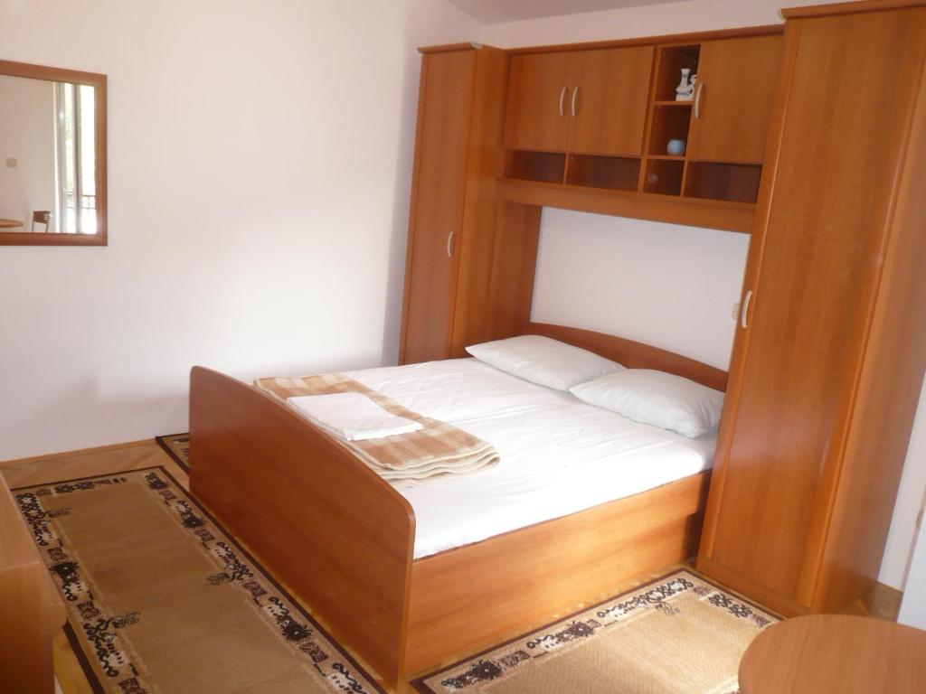 Postel nebo postele na pokoji v ubytování Apartments Šarić