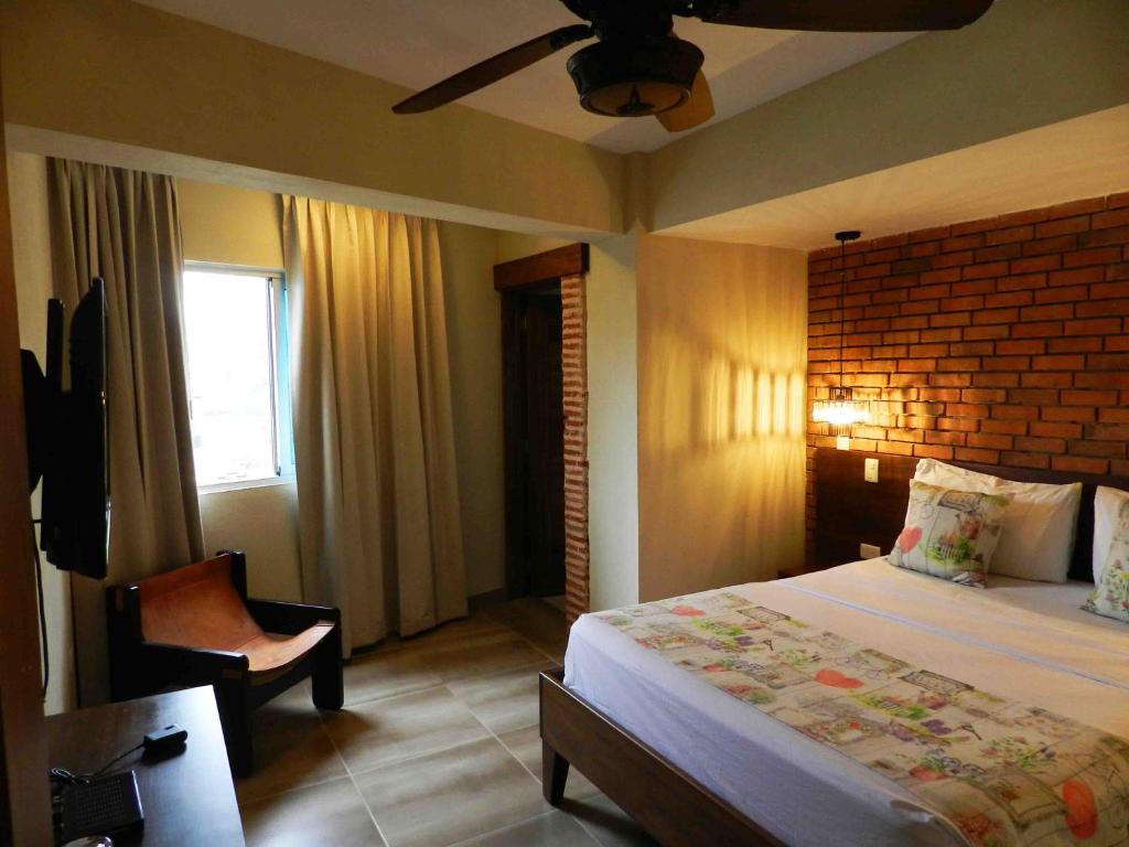 Postel nebo postele na pokoji v ubytování MON Hotel Boutique