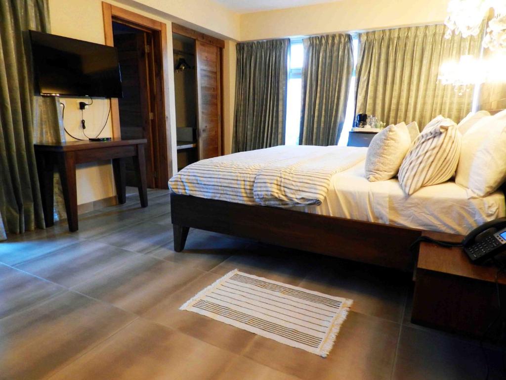Postel nebo postele na pokoji v ubytování MON Hotel Boutique
