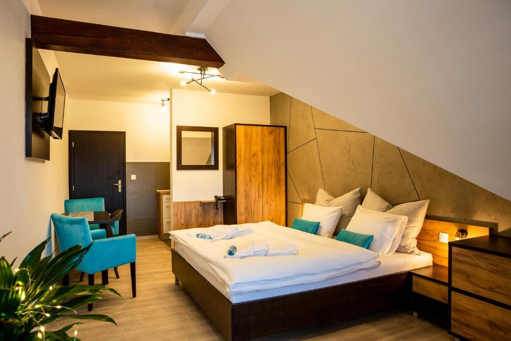 A bed or beds in a room at Apartmán Dagmar