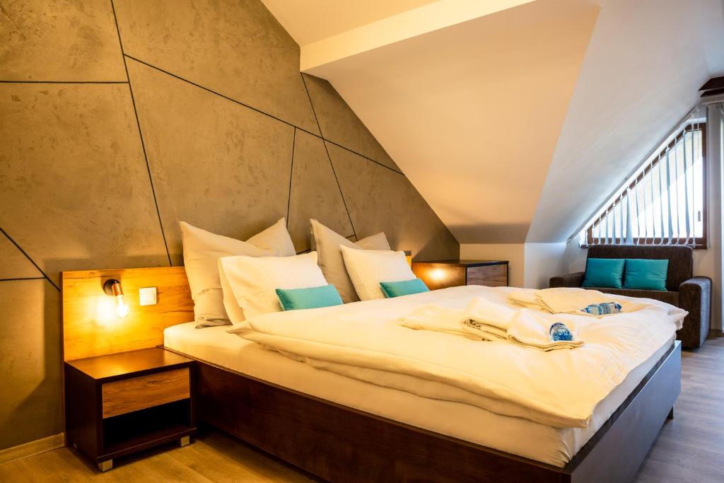 A bed or beds in a room at Apartmán Dagmar