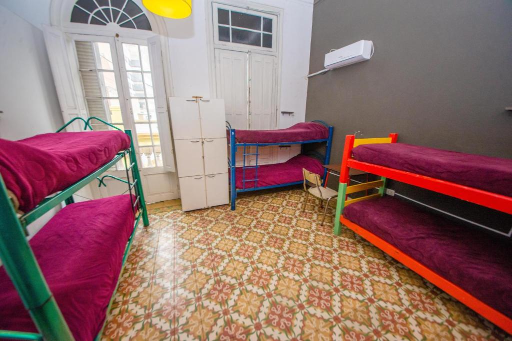 Postel nebo postele na pokoji v ubytování Hostel Alvear
