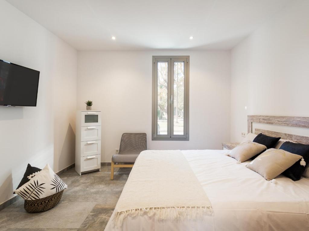 Postel nebo postele na pokoji v ubytování Villa margalida