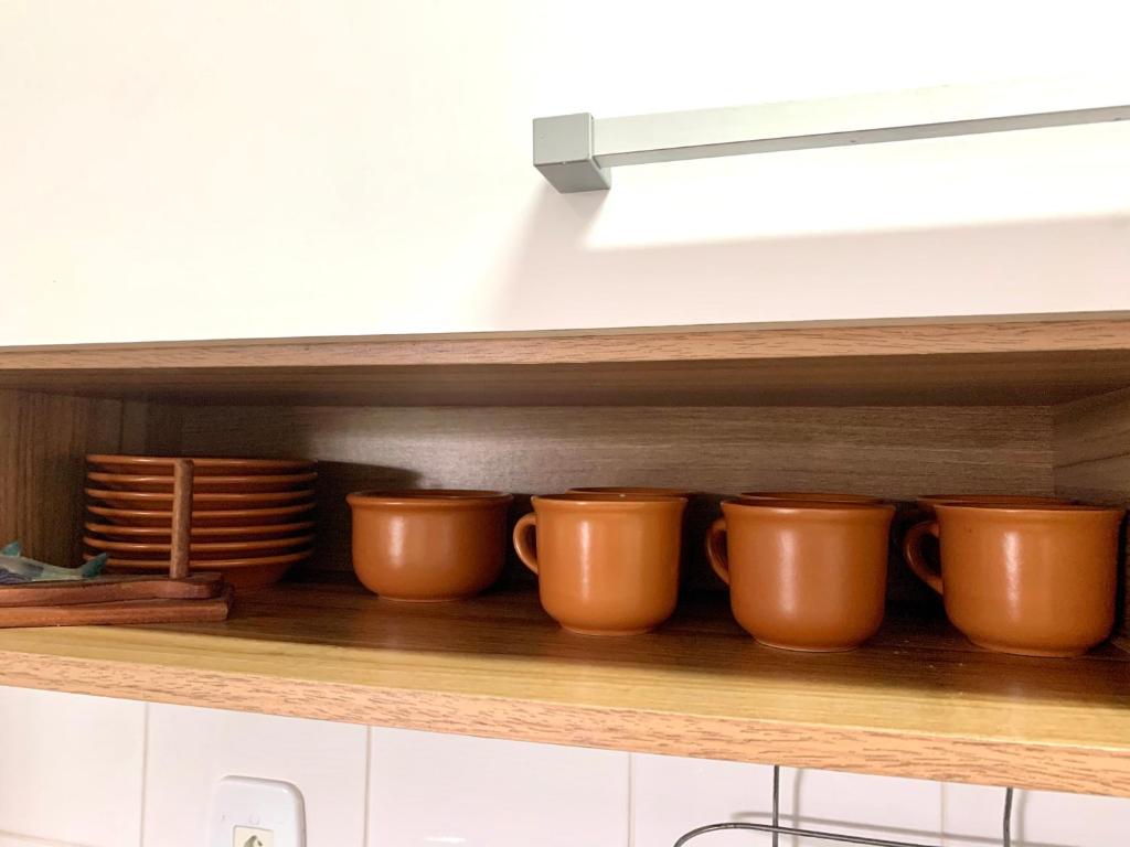  Apto 2 QTs c Garagem e Piscina no Centro