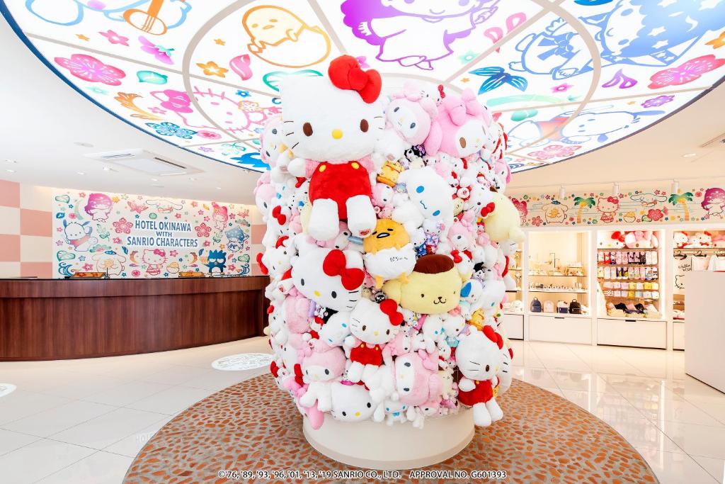 a display of hello kitty stuffed animals in a store at HOTEL OKINAWA WITH SANRIO CHARACTERS in Naha