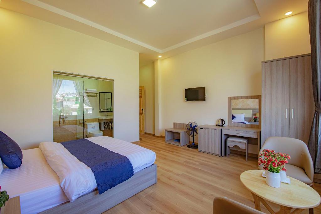 Khanh Uyen 1 Hotel客房内的一张或多张床位