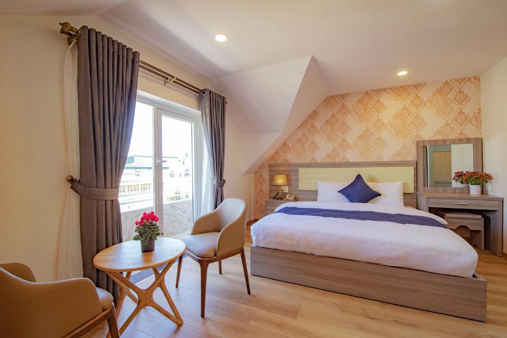 Khanh Uyen 1 Hotel客房内的一张或多张床位