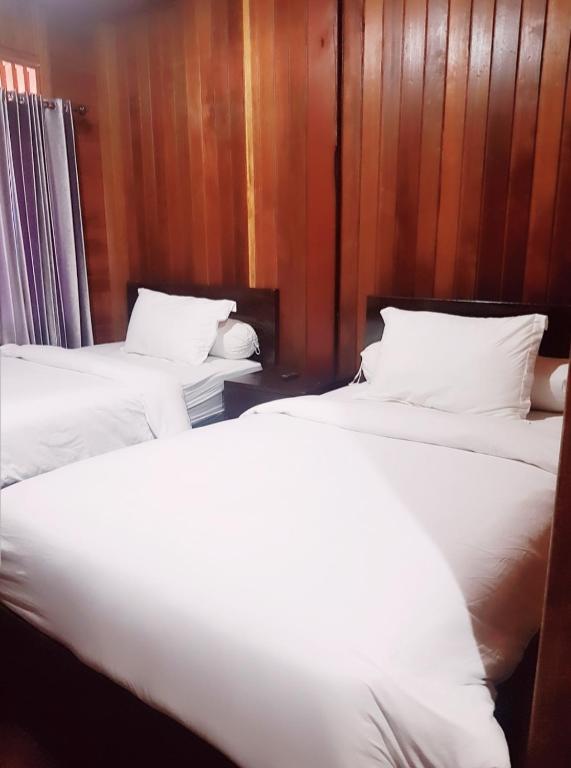 Postel nebo postele na pokoji v ubytování Korpak Villa & Resort Raja Ampat