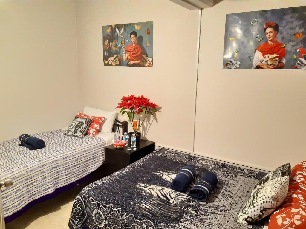 Postel nebo postele na pokoji v ubytování Alameda House