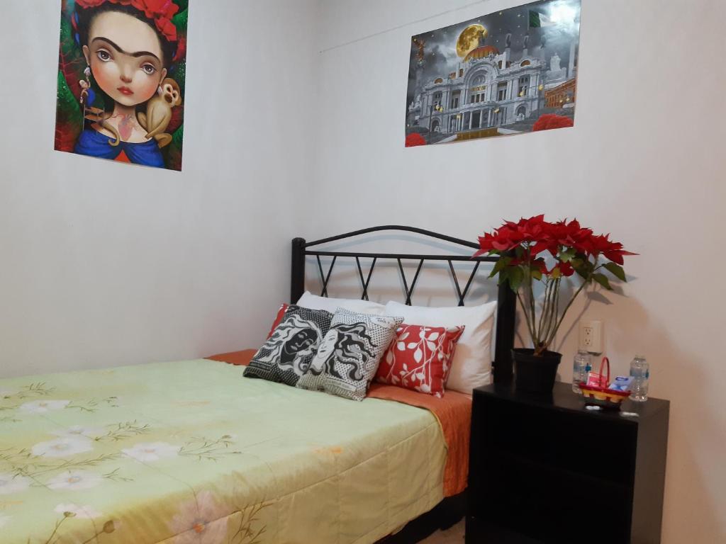 Postel nebo postele na pokoji v ubytování Alameda House