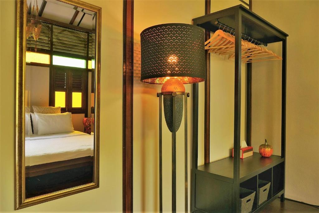 Postel nebo postele na pokoji v ubytování Villa Kelapa Langkawi