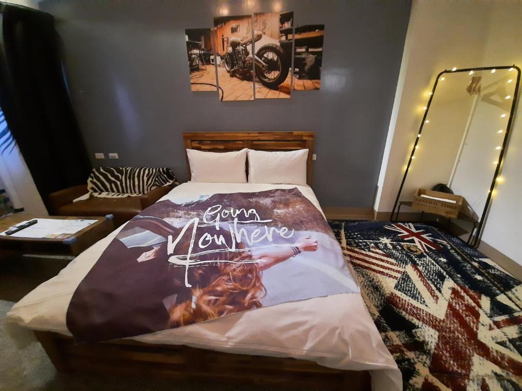 Postel nebo postele na pokoji v ubytování Kiss 2.0