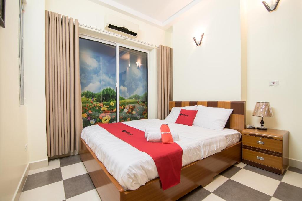 Giường trong phòng chung tại Hai Duong Apartments 70 Van Kiep