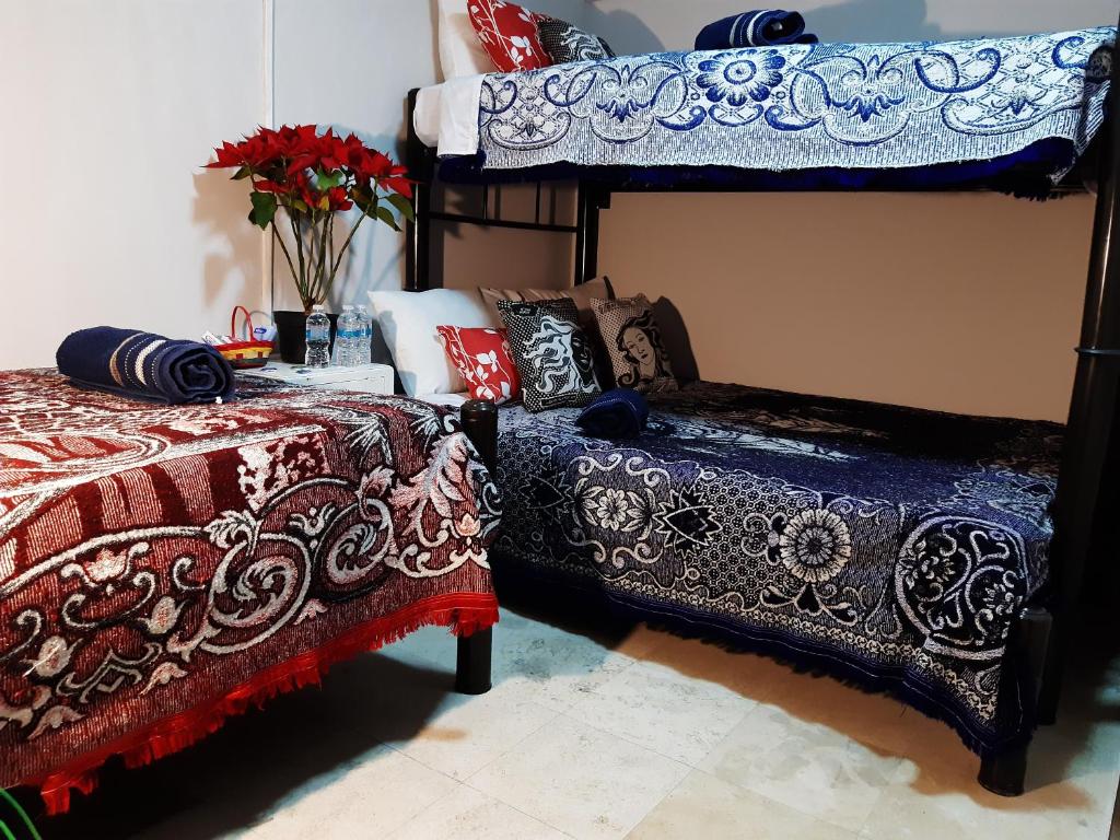 Postel nebo postele na pokoji v ubytování Alameda House