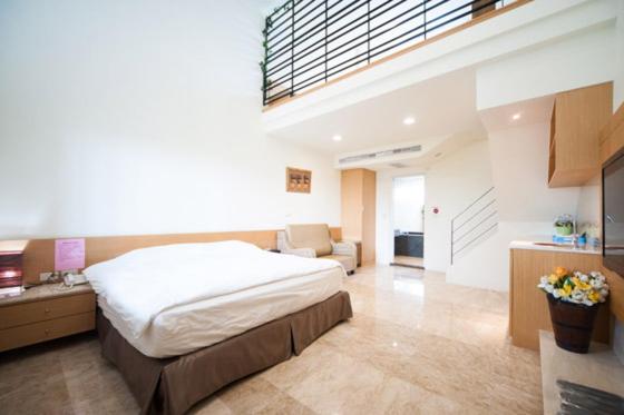 Postel nebo postele na pokoji v ubytování Palm Island B&B