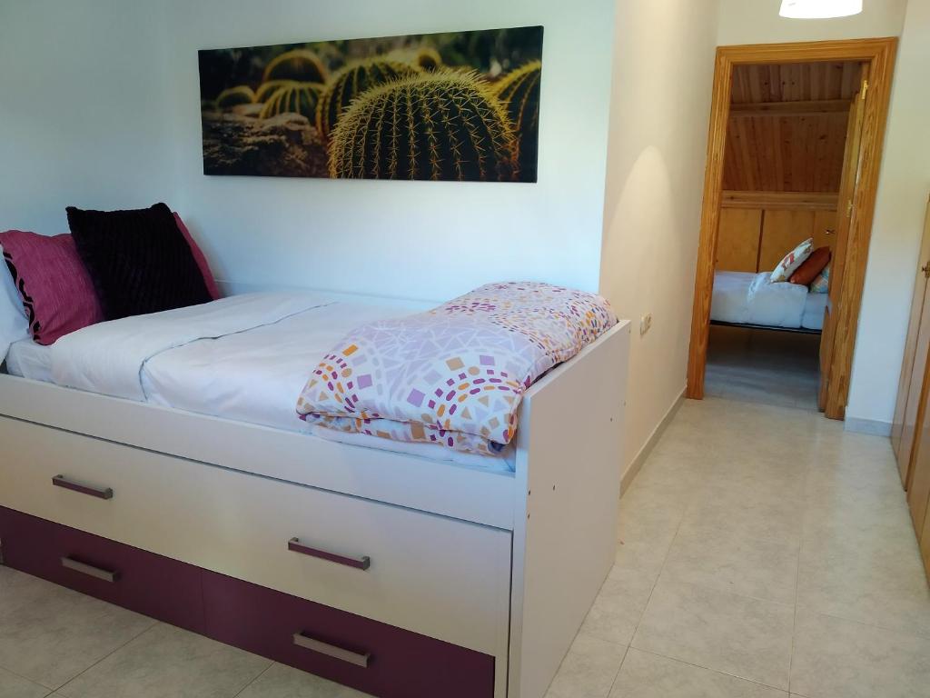 Postel nebo postele na pokoji v ubytování Alojamiento Rural Monte del Sol