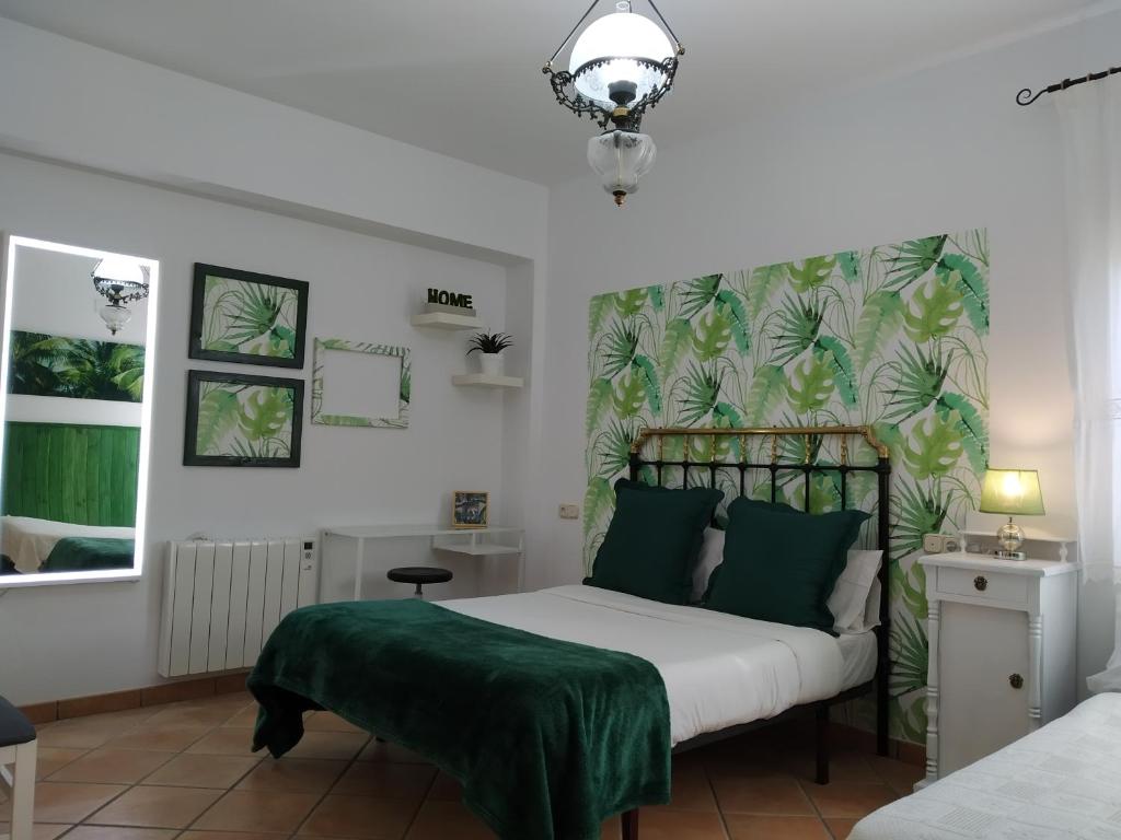 Postel nebo postele na pokoji v ubytování Alojamiento Rural Monte del Sol