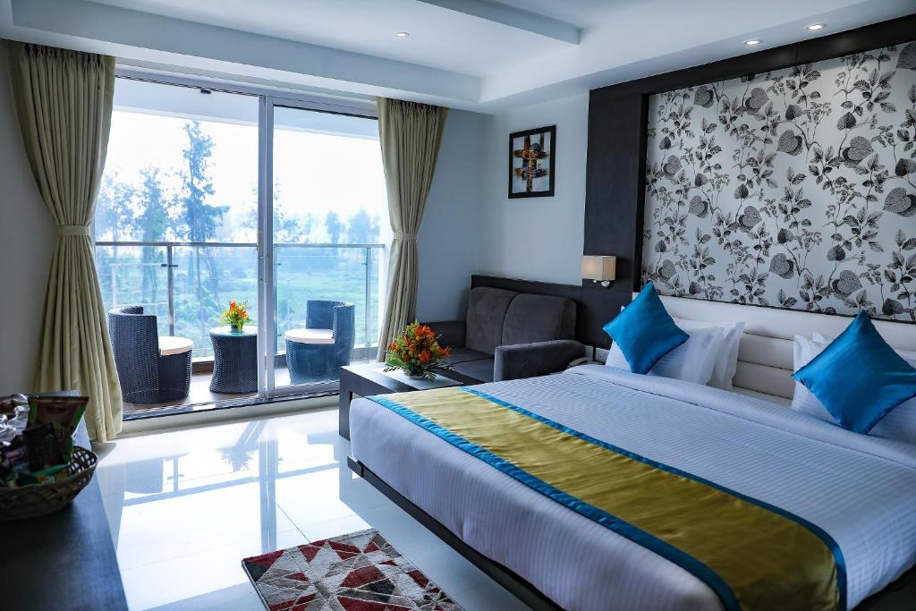 Postel nebo postele na pokoji v ubytování Cygnett Inn Sea View