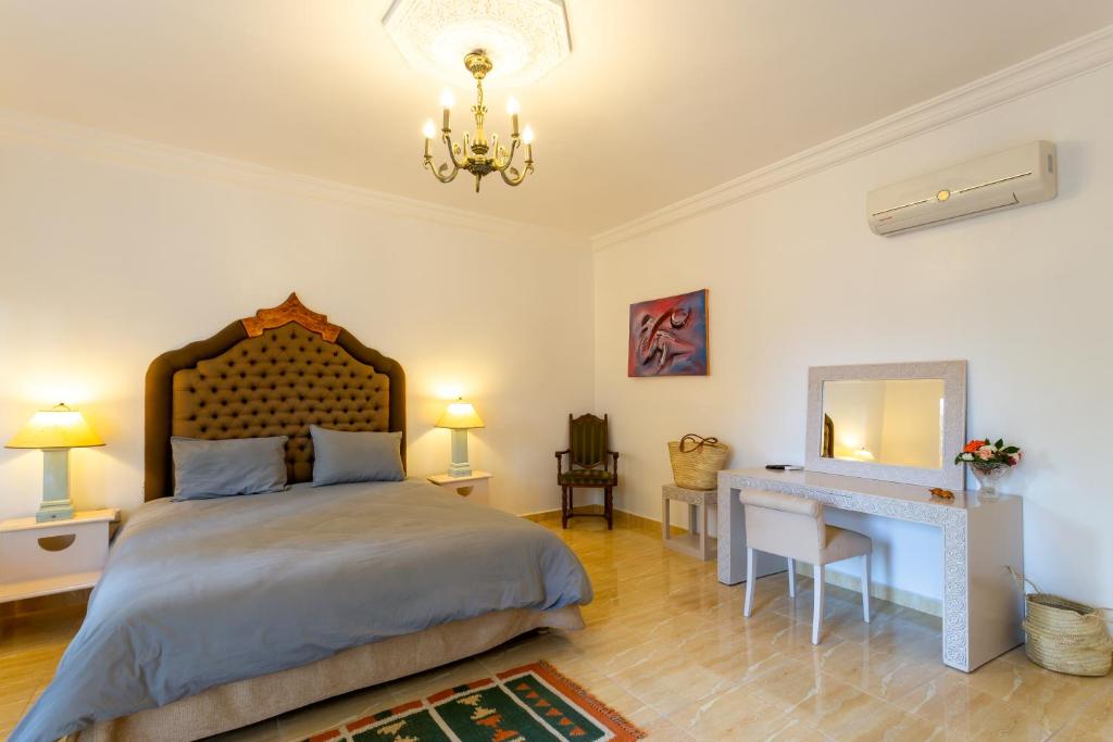 Postel nebo postele na pokoji v ubytování Villa Ayche