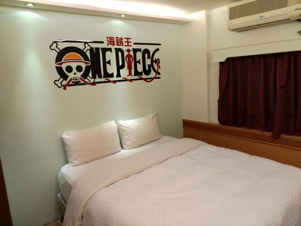 Postel nebo postele na pokoji v ubytování Hong Ben Hotel