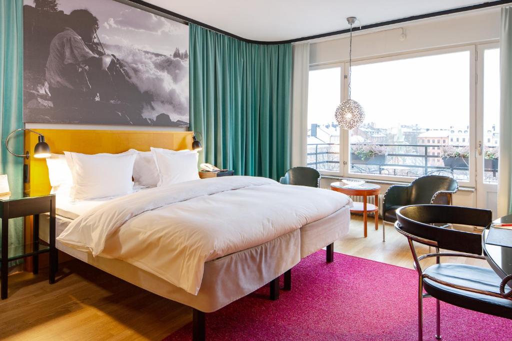 Postel nebo postele na pokoji v ubytování Hotel Rival
