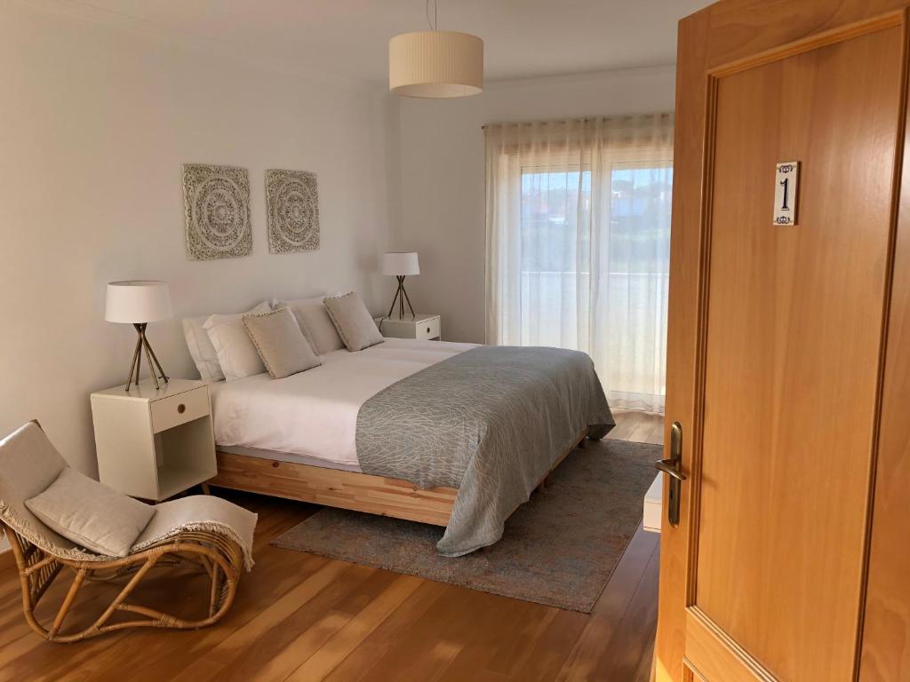 Кровать или кровати в номере Casa Artelena