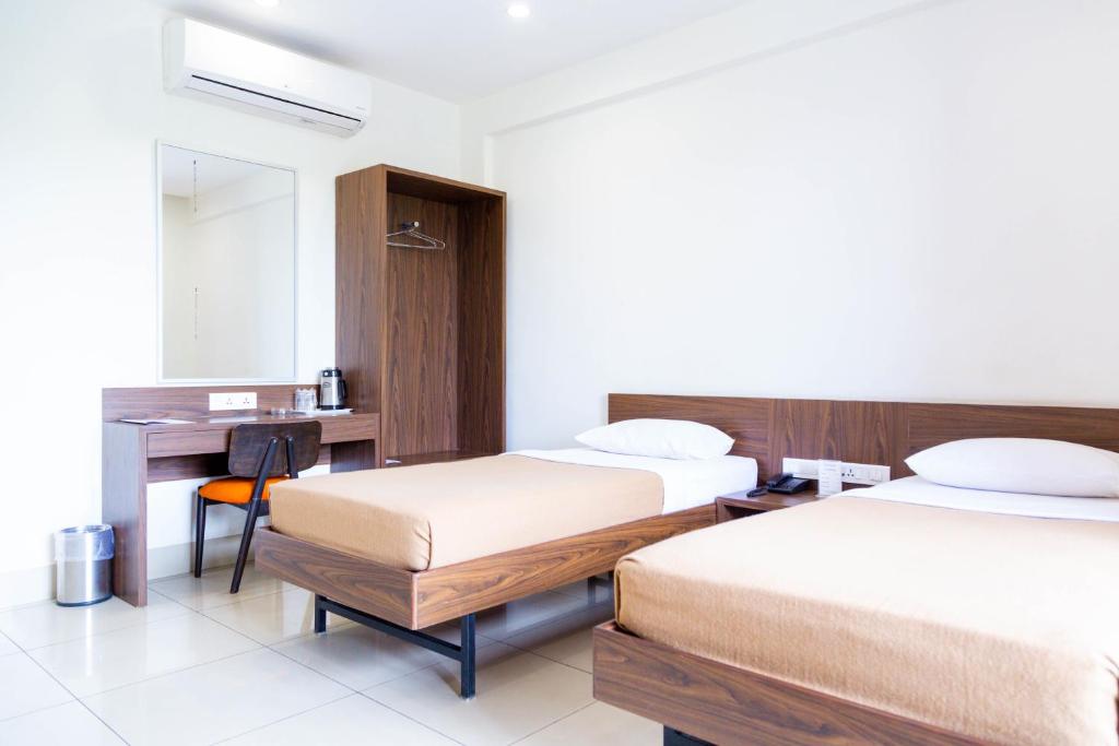 Postel nebo postele na pokoji v ubytování Hotel Dreamland