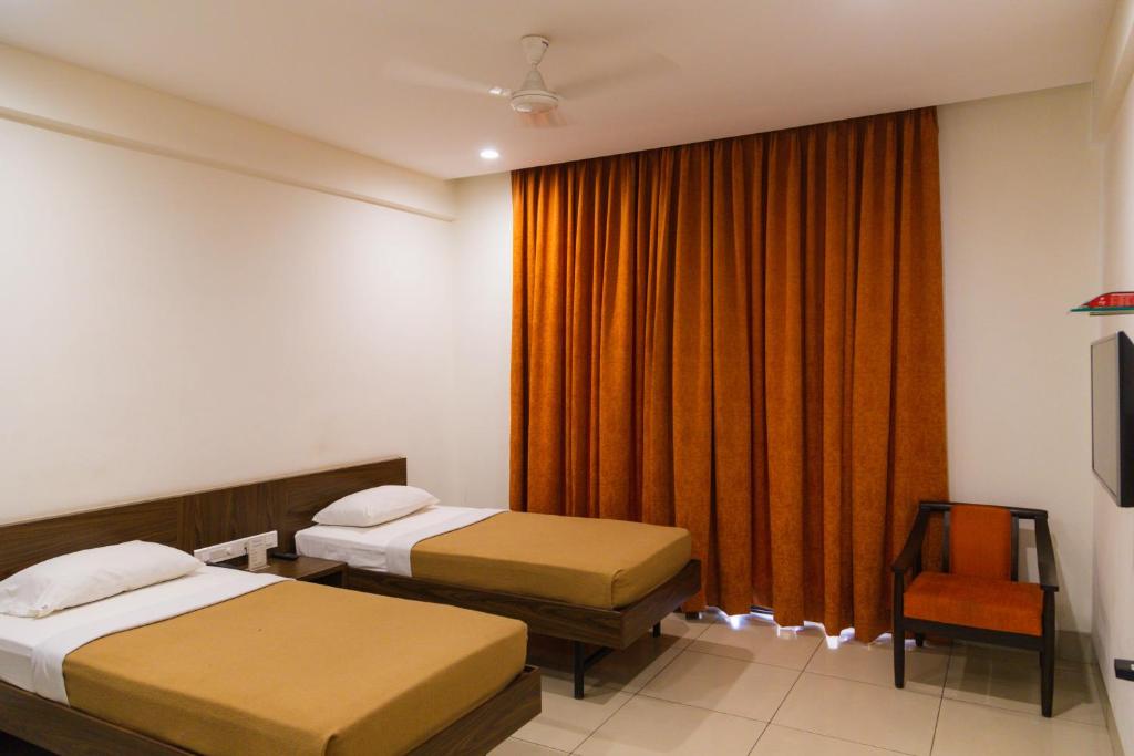 Postel nebo postele na pokoji v ubytování Hotel Dreamland
