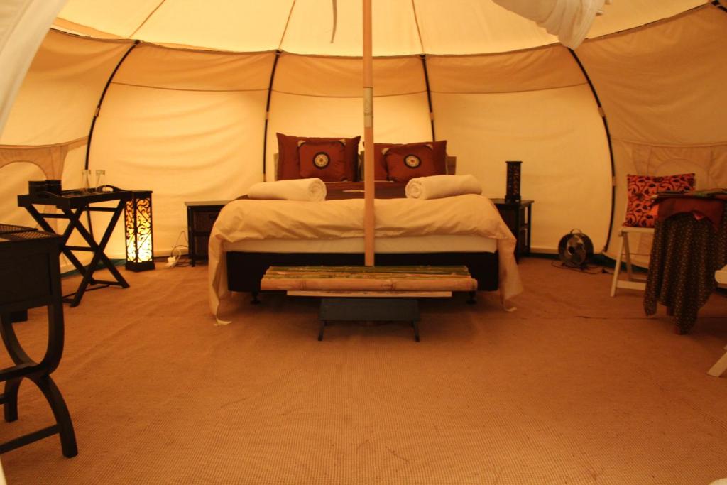 Postel nebo postele na pokoji v ubytování Kerikeri Glamping
