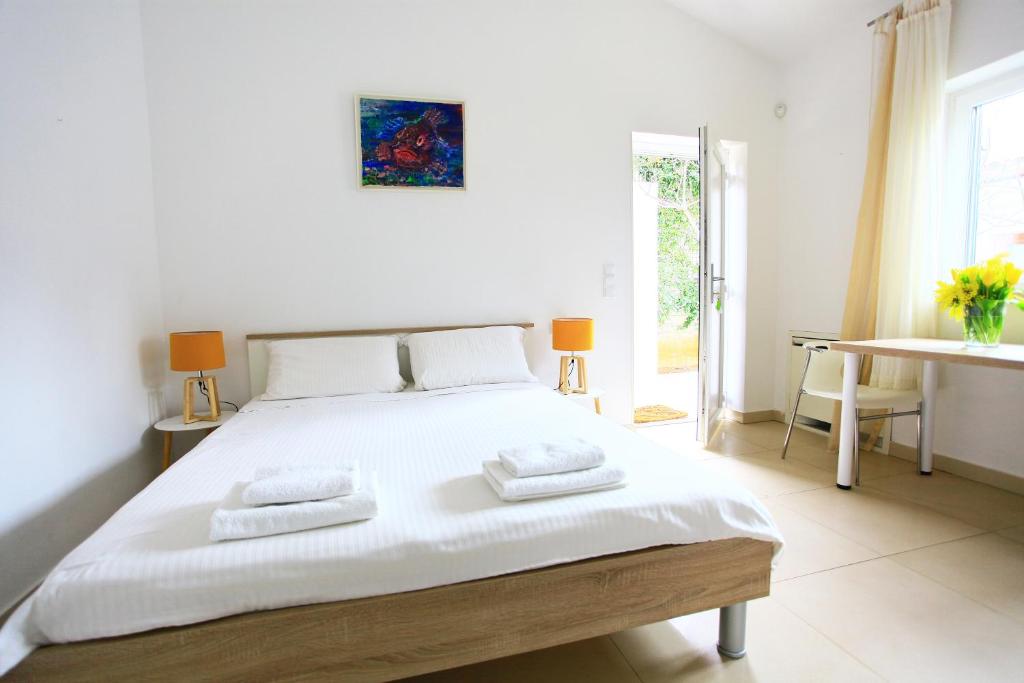Posteľ alebo postele v izbe v ubytovaní Apartmani Val