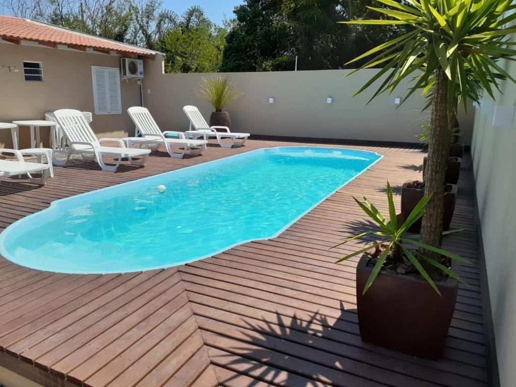  CASA AMBAR COM PISCINA EM Mariscal N 705