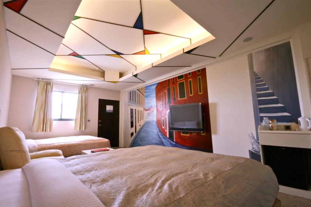 Postel nebo postele na pokoji v ubytování Fair Tale Motel - Sea