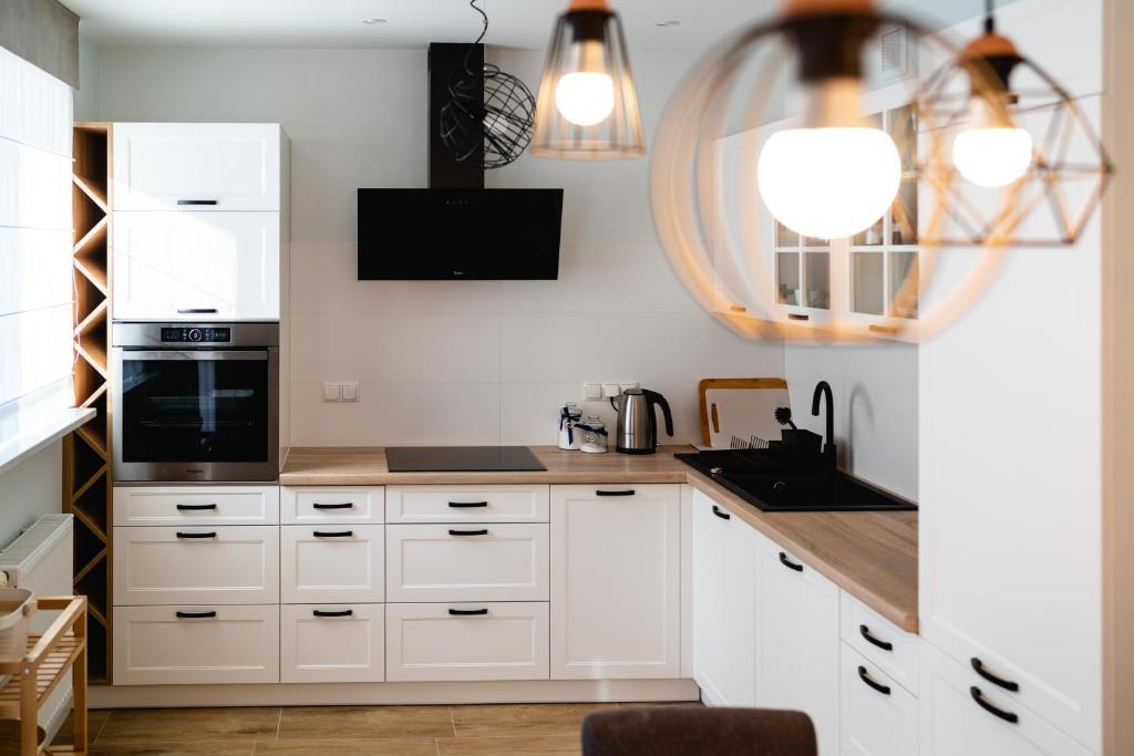 Kuchyňa alebo kuchynka v ubytovaní Apartamenty Wczasowa